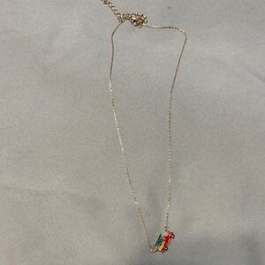 Elegant Gold Necklace with Red Christmas Truck